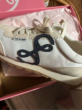 Sam & Libby Women's Cream Logo Accent Sneaker